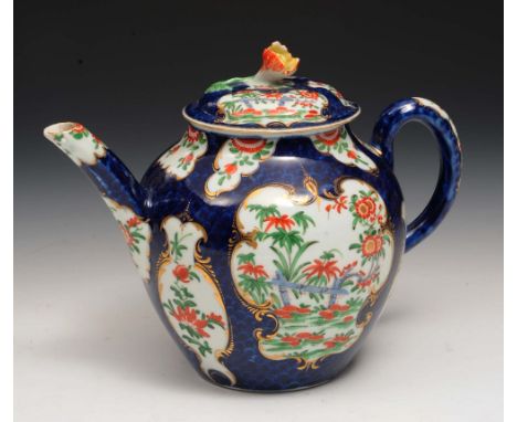 A Worcester scale blue teapot and cover circa 1765-70, mirror shaped panels of 'rich Kakiemon' foliage and banded hedges, squ