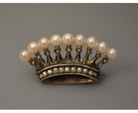 A French bar brooch in the form of a coronet with stylised pearl and seed pearl decoration