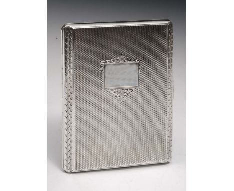 A silver cigarette case with engine turned decoration and gilt interior, Birmingham 1958, 117 grams, in original presentation