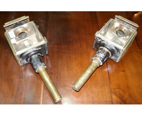 A pair of Victorian carriage lamps and an old railway lamp