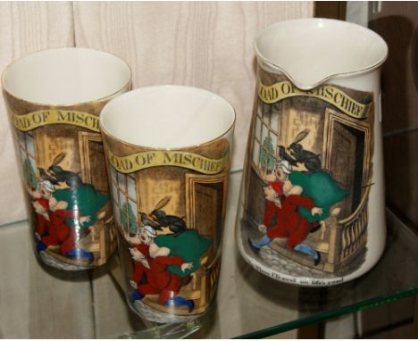 A W H Goss jug inscribed 'A Load of Mischief' and two matching beakers