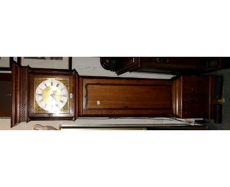 Henry Fielders of Tamworth An eight day longcase clock having a brass and silvered dial with date aperture in a mahogany cros