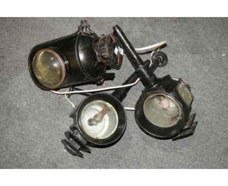 A pair of Victorian carriage lamps and an old railway lamp