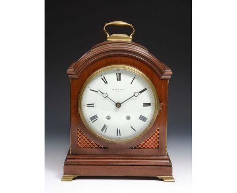 A Regency style bracket clock with enamel dial and brass fittings, movement replaced by a battery