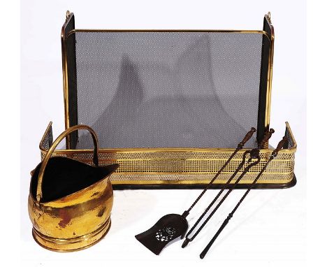 A collection of fire furniture to incude a wire and mesh brass three fold fire guard, 175cm long, a helmet shaped coal scuttl