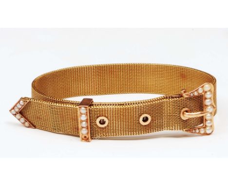 An 18ct gold bracelet in the form of a belt with pearl decoration, buckles and strap, 18 grams