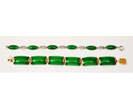 A modern Chinese green jade bracelet with 14k gold mounts and clasp, stamped 585, together with a further Chinese jade bracel