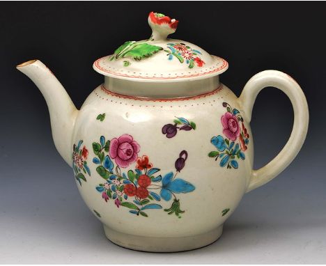 Worcester teapot circa 1770, decorated in polychrome enamels with flower sprays, the lid with floral finial, 14cm high