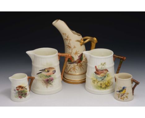 A Royal Worcester blush ivory jug in the aesthetic style painted with an exotic bird, 19cm high and two other pairs of Royal 