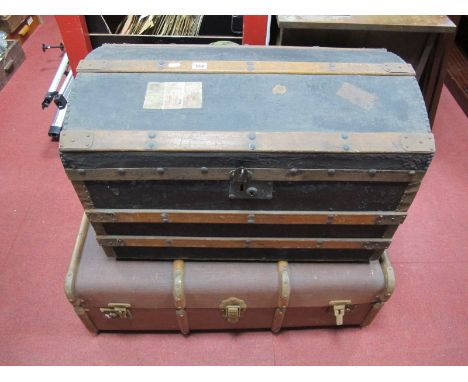 An Early XX Century Domed Top Trunk, together with a brown suitcase. (2)