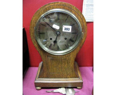 A Late XIX/Early XX Century Balloon Shaped Mantel Clock, silvered dial, Roman numerals, on gilded brass bun feet (stamped M.B