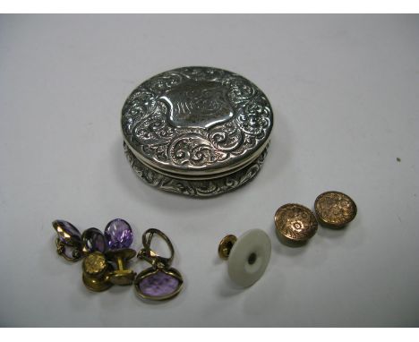 A Hallmarked Silver Trinket Pot, of circular form allover leaf scroll decorated, initialled; together with a pair of cufflink