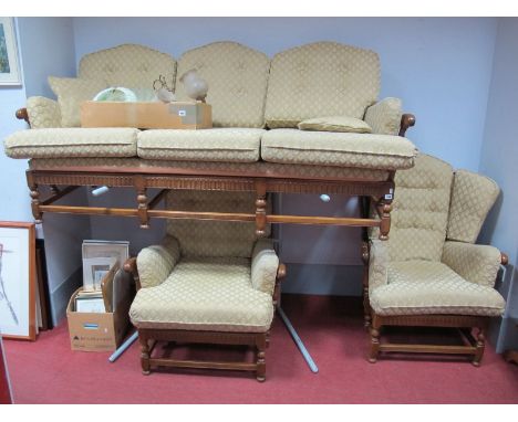 Ercol Three Seater Settee, high and low back easy chairs, all with arched and spindle design.