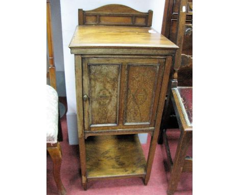 A Maple & Co. (Tottenham Court Road) London Late XIX Century Rosewood Pot Cupboard, with a low back, moulded edge, two panell