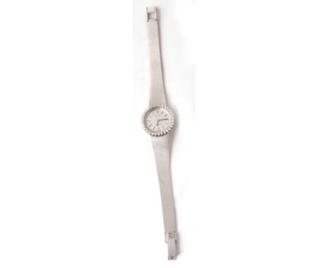 A 18CT WHITE GOLDLADIES TISSOT WATCH INTEGRAL BRACELET DIAMOND SET BEZEL WITH ROUND CLAW SET DIAMONDS