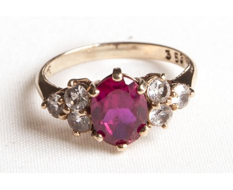 A 9CT RED STONE AND CZ RING, SIZE K, WEIGHT 2G