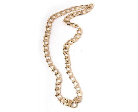 A 9CT YELLOW GOLD HEAVY SET CURB CHAIN, SECURED WITH A TRIGGER CLASP, LENGTH 22", WEIGHT 88.21G