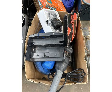 A Taclife angle grinder together with other workshop items