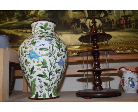 Continental style pottery vase together with a bobbin stand?