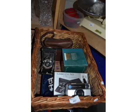 Kodak Instamatic 155X camera together with two other cameras, pewter tankard, Imari style trio of bells etc