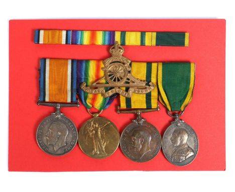 Four: BWM, Victory, Territorial War medal (101, Dvr, RA), Territorial Force Efficiency Medal (905109 Dvr R W Roberts, RA), VF