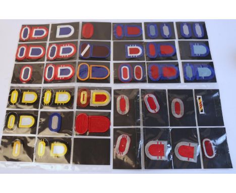 Approximately 50 metal US insignia, mostly post WWII enamelled plus 50 cloth patches and backing badges for beret. (100) £50-