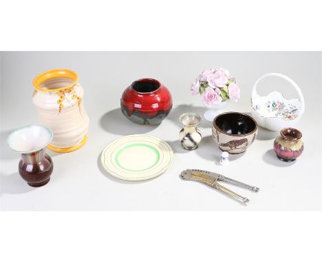 A collection of ceramics including a signed Clarice Cliff side plate in cream with ridged border and scalloped edge,together 
