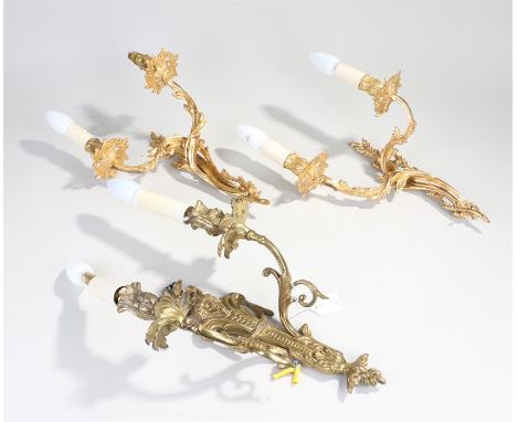 Pair of Regency style wall lights, with acanthus leaf arms, together with another wall light, (3) 
