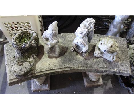 Concrete garden bench, with garden ornaments 