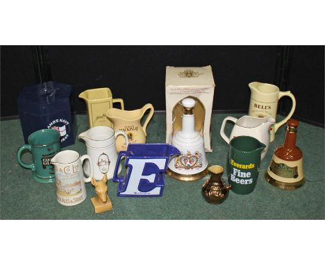 Wade Bell's Whisky Charles and Diana Wedding commemorative decanter, together with a collection of whisky jugs and decanters 