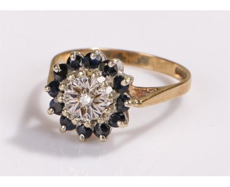 9 carat gold ring, set with a central diamond and sapphire surround, ring size R