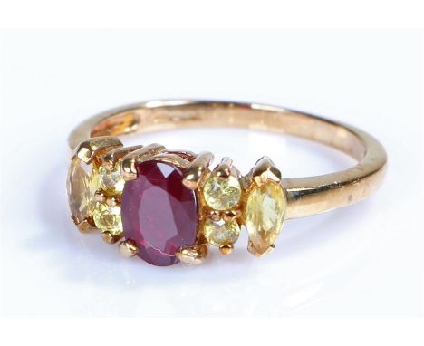 9 carat gold simulated ruby ring, with a central simulated ruby