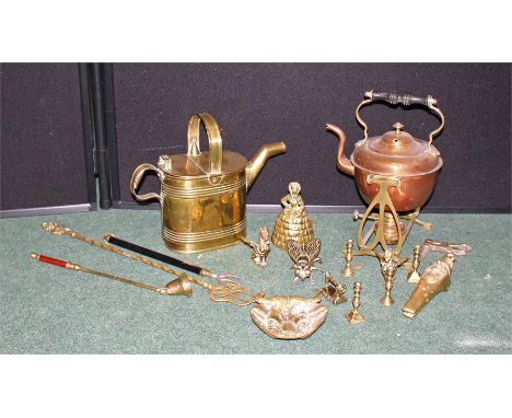 Collection of brass and copper, including a copper kettle and stand, a brass nutcracker, and a brass kettle (qty) 