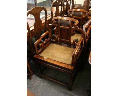 Pair of Chinese hardwood throne chairs having shaped carved panelled backs with open scroll arms on square supports united by