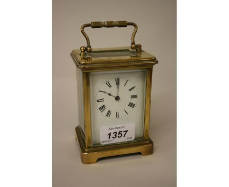 French gilt brass time piece carriage clock, the enamel dial with Roman numerals