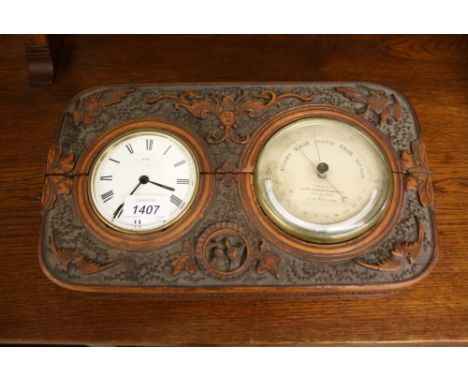 19th Century Chinese carved wooden hanging cabinet enclosing A. Dent of London clock and an aneroid barometer inscribed ' Mad