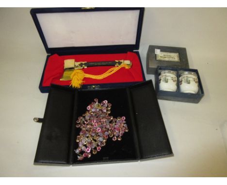 Presentation naming axe together with a costume jewellery necklace with earrings and a pair of boxed Royal Worcester egg codd