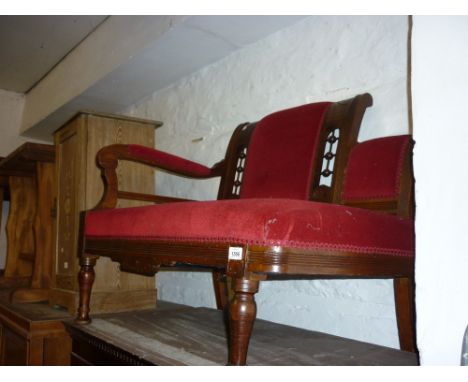 Small Edwardian burgundy upholstered and stained beechwood single end sofa 