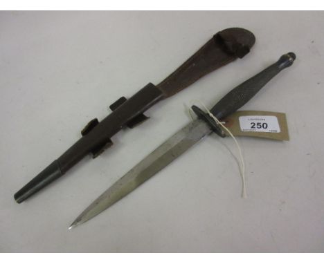 World War II Commando knife with leather scabbard by Wilkinson Sword Company, London