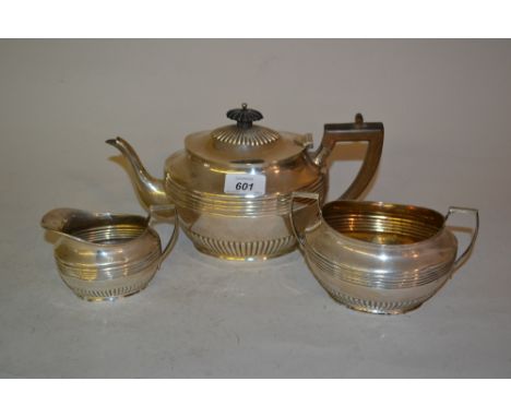 Early 20th Century Sheffield silver three piece tea service of oval reeded and gadrooned design, maker H.S.