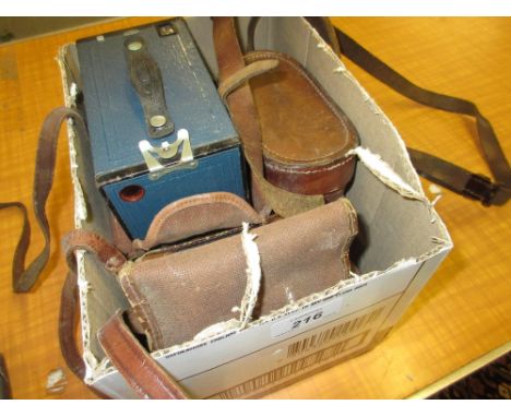 Kodak No. 2 Brownie camera in blue, similar box camera and a cased pair of field glasses