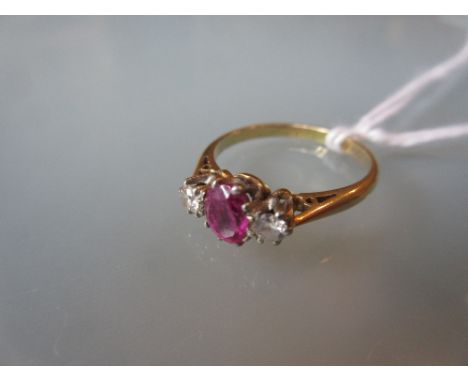18ct Yellow gold and platinum three stone ruby and diamond ring