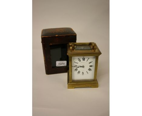 Early 20th Century French gilt brass carriage clock, the enamel dial with Roman numerals, inscribed Elkington and Co. Paris, 