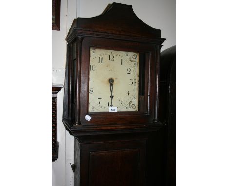 George III oak longcase clock having square painted dial with Arabic numerals and thirty hour movement with a flush panelled 