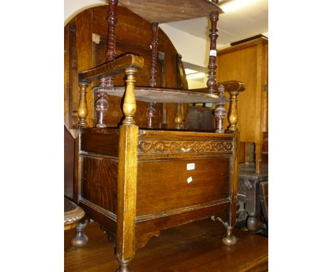 Early 20th Century oak monks bench with a circular fold-over top