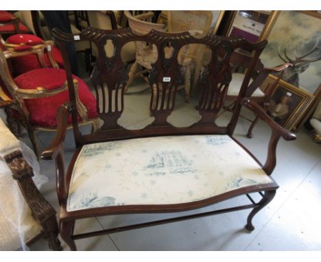 Good quality Edwardian mahogany two seater drawing room sofa with a triple pierced splat back above an upholstered seat on ca