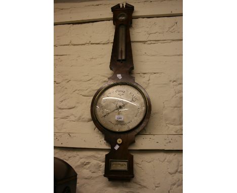 19th Century mahogany wheel barometer with silvered dials, inscribed ' Liveroni, St. Grays Inn '