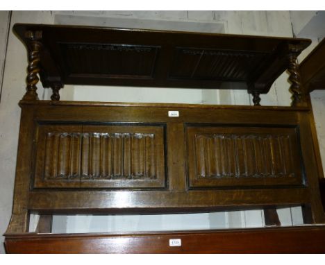 Early 20th Century oak monks bench with barley twist uprights and linen fold carved panelled base together with an oak gate l