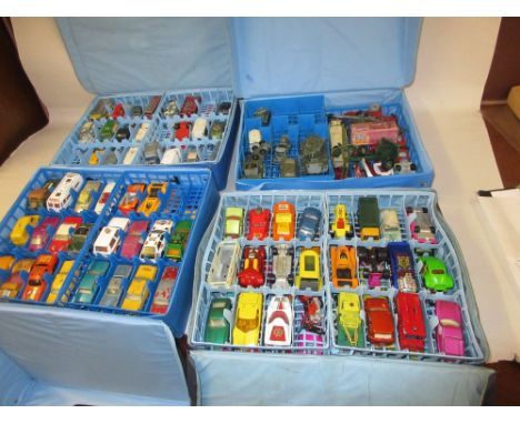 Four collector's cases containing various die-case metal model vehicles