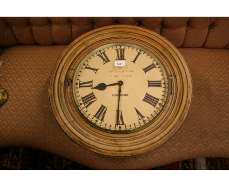 Large late 19th Century oak cased circular wall clock, the painted dial with Roman numerals, with a single train fusee moveme